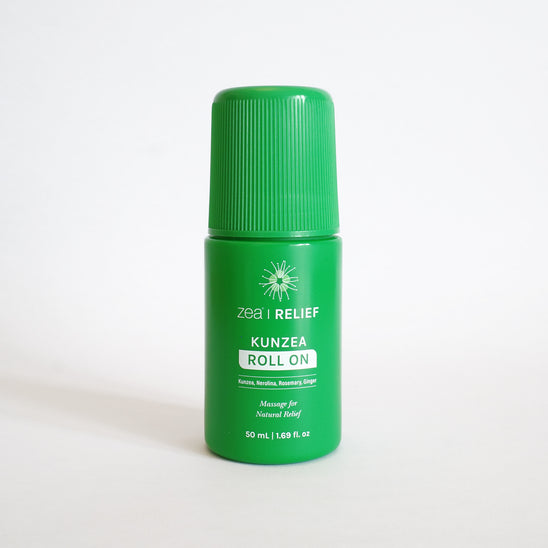 Green roll-on bottle labeled 'Kunzea Roll On' on a white background