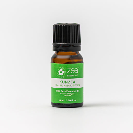 A small bottle of Zea Essentials Australian Kunzea Essential Oil with a green label.